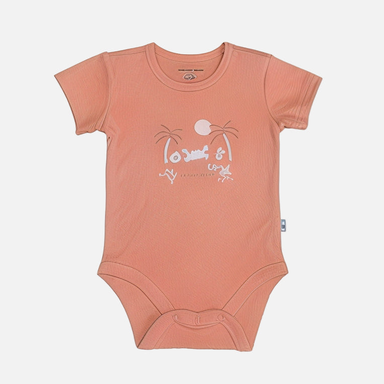 Peach-colored baby onesie with a graphic design on a white background