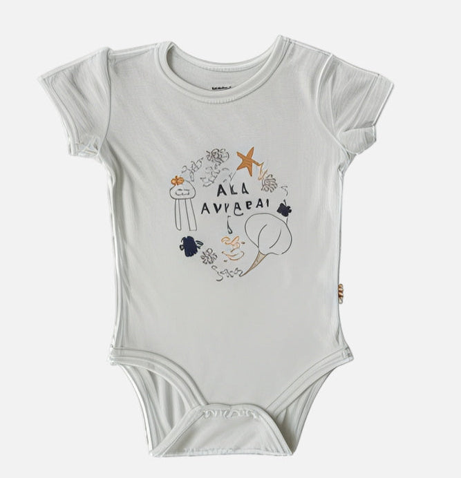 White baby onesie with sea-themed graphics and text on a white background