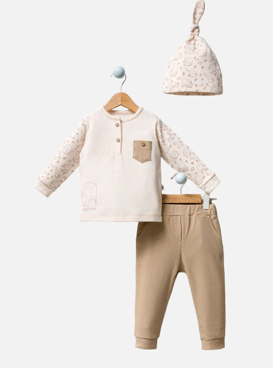 Children's outfit with a shirt, pants, and hat on a white background