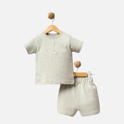 Children's outfit with shirt and shorts on a white background, branded 'Shiny Moon'.