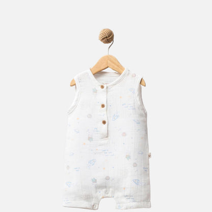 Baby romper with star pattern on a hanger against a white background