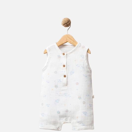 Baby romper with star pattern on a hanger against a white background