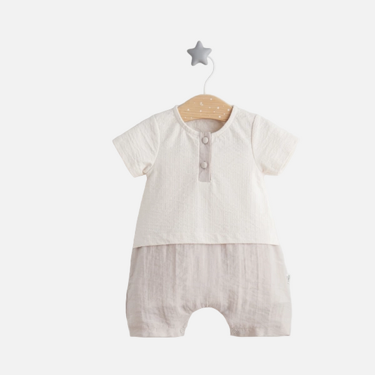 Baby romper with a plain background