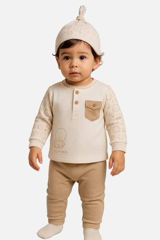 Child wearing a beige outfit with a logo on a plain background