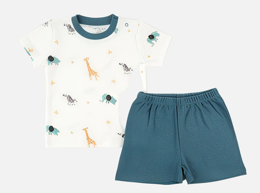 Children's t-shirt with animal prints and blue shorts on a white background